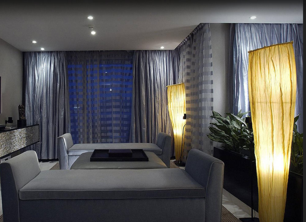 The Park Chennai Hotel Exterior photo A room with a blue curtain